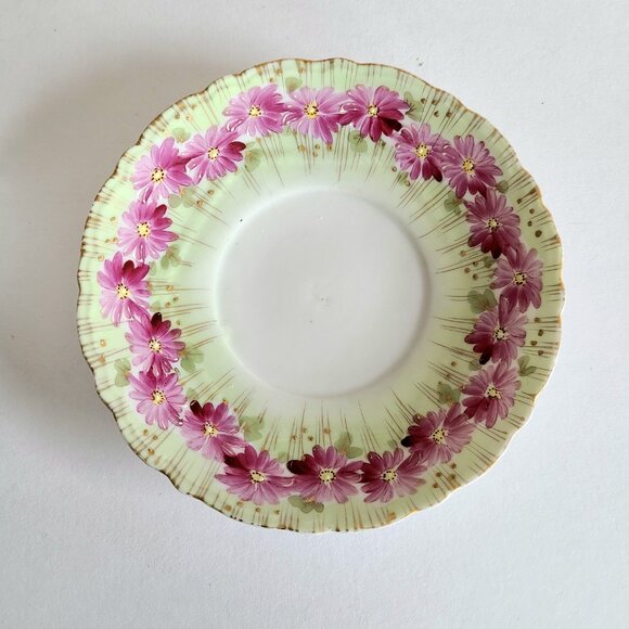 Antique porcelain tea cup with saucer with pink floral design and gold trim. - Picture 7 of 13